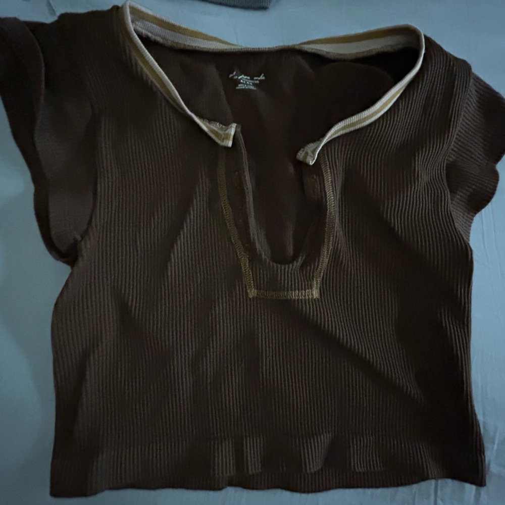 This is an Urban Outfitters cropped tee. It is barely worn.